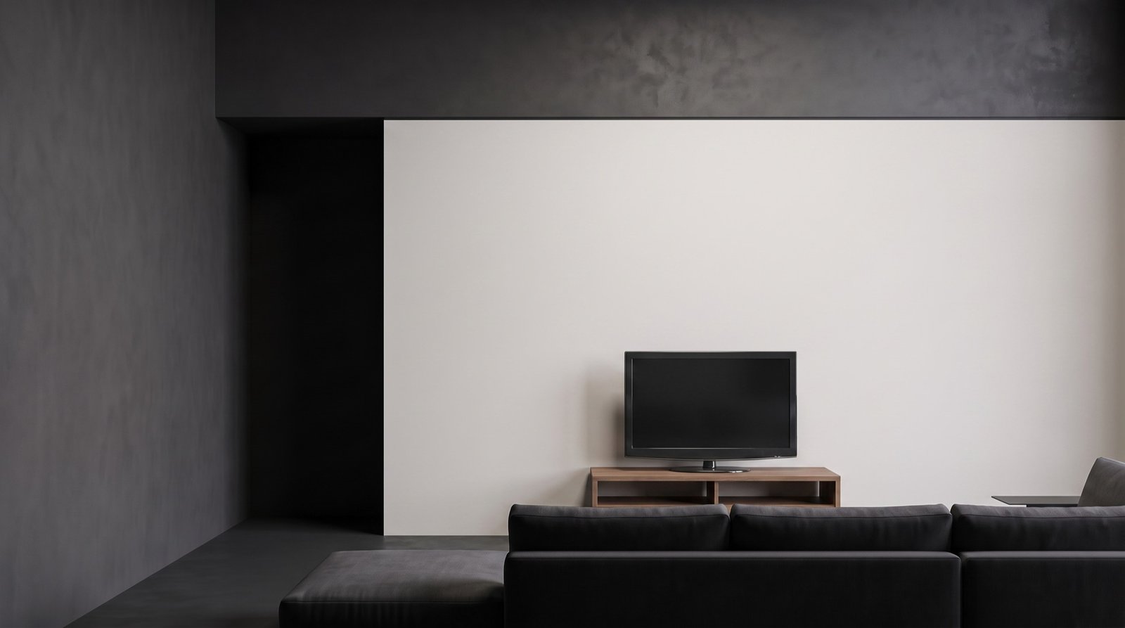 Living room before: plain off-white drywall with an old television on a stand